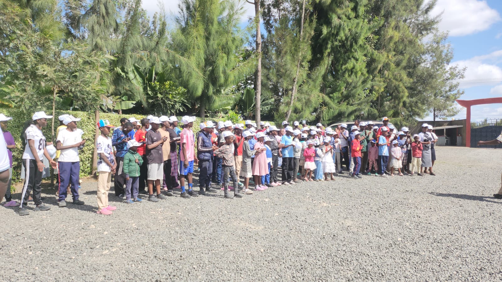 Children standing in the school welcoming area